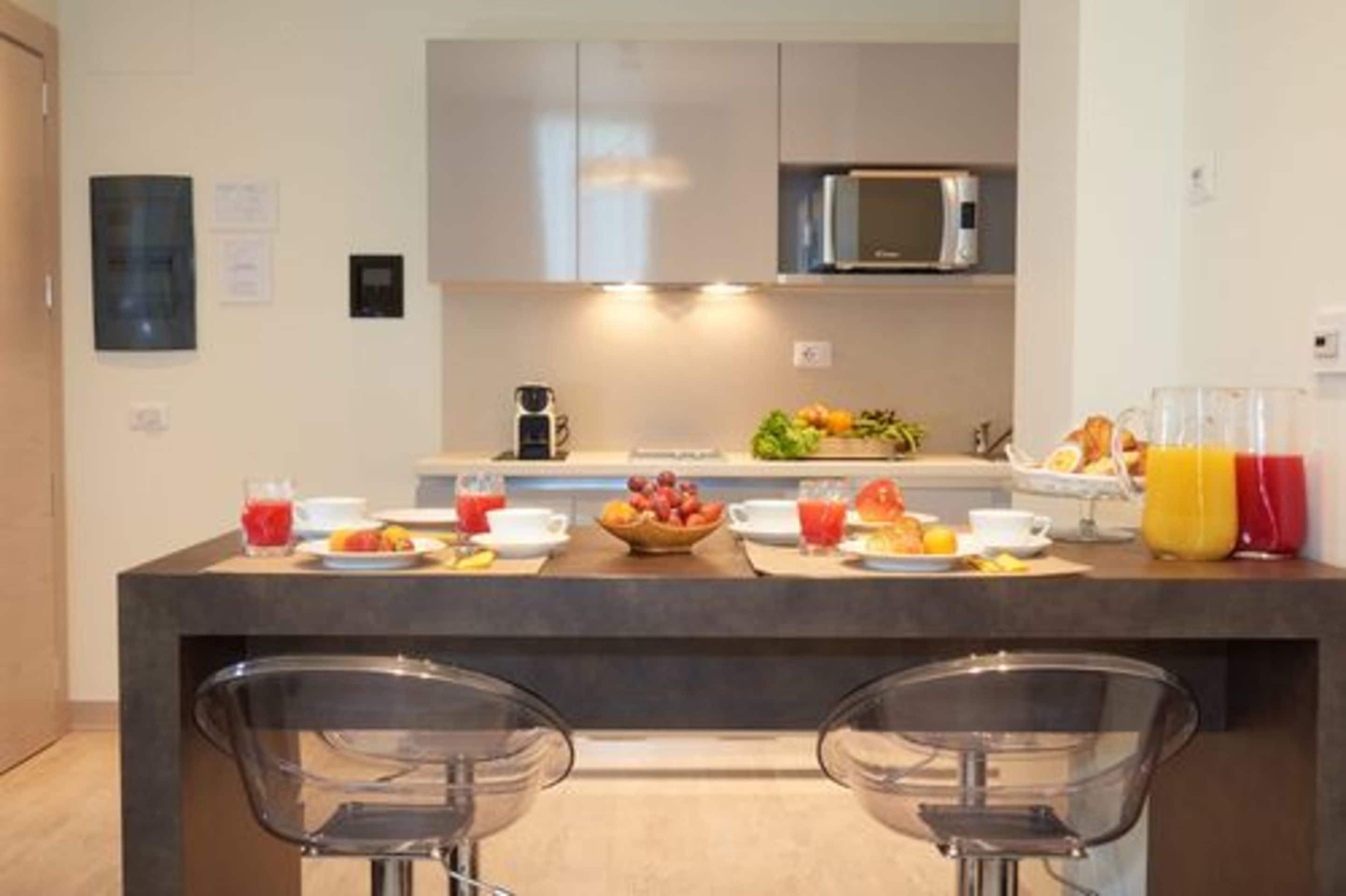 Family Suite | Private kitchenette | Fridge, microwave, stovetop, dishwasher
