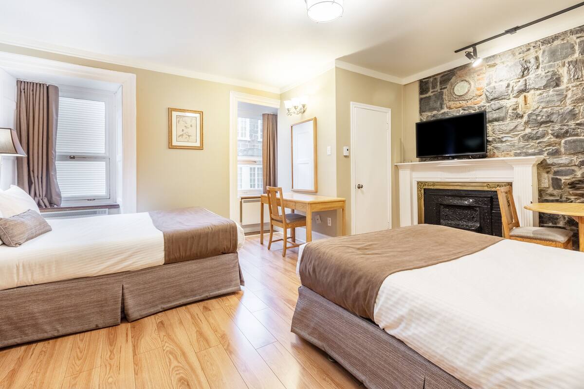 Standaard kamer, 2 tweepersoonsbedden | Gratis wifi, individueel gemeubileerd, beddengoed