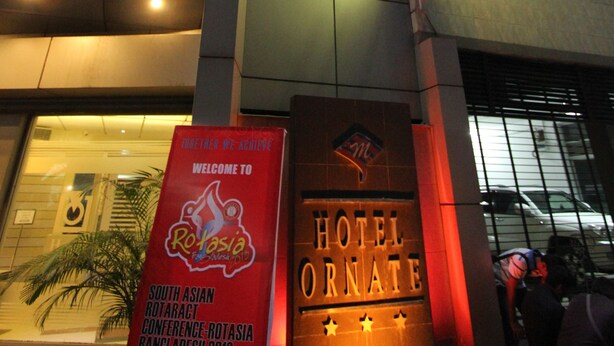 A hotel entrance with a sign reading "HOTEL ORNATE." - Hotel Ornate (Dhaka)