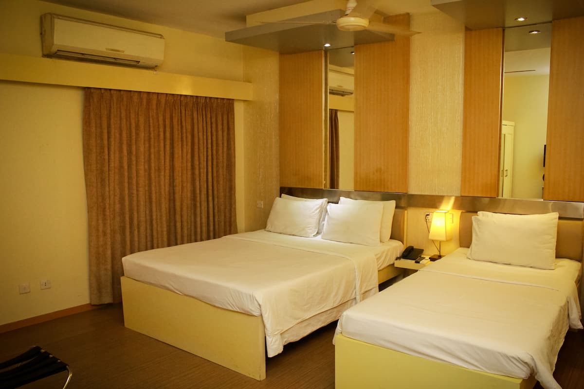 Chambre Triple Deluxe, plusieurs lits