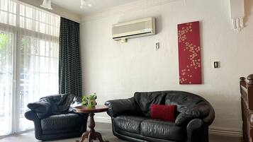 Executive Suite | Living area | LED TV