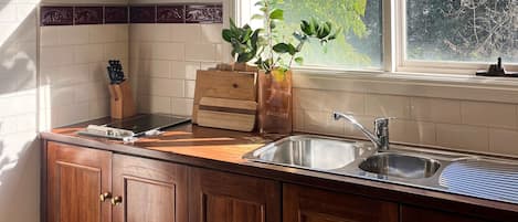 Family Suite | Private kitchen | Fridge, microwave, coffee/tea maker, electric kettle