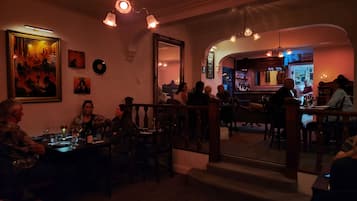 Breakfast, lunch, dinner served; local cuisine, garden views