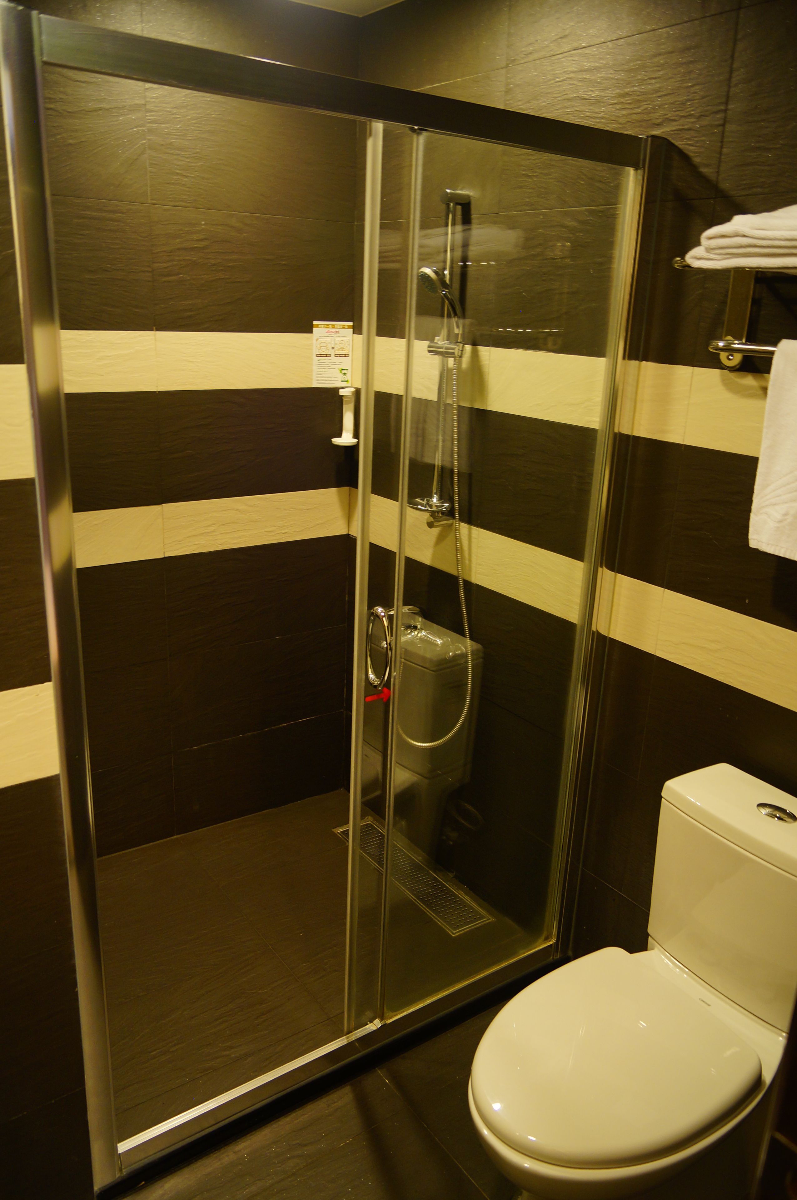 deluxe family room | bathroom | hair dryer, towels