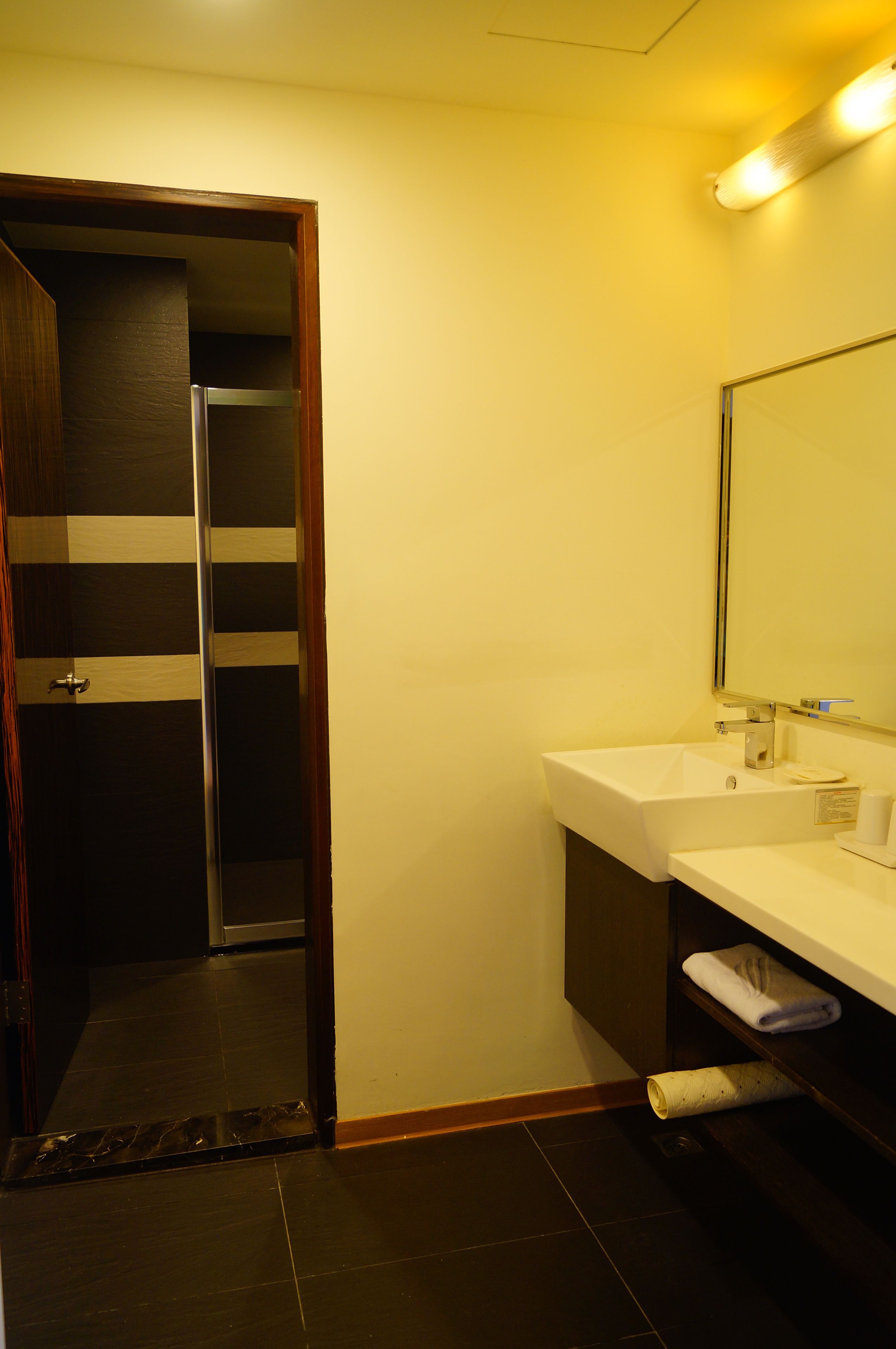 deluxe family room | bathroom | hair dryer, towels