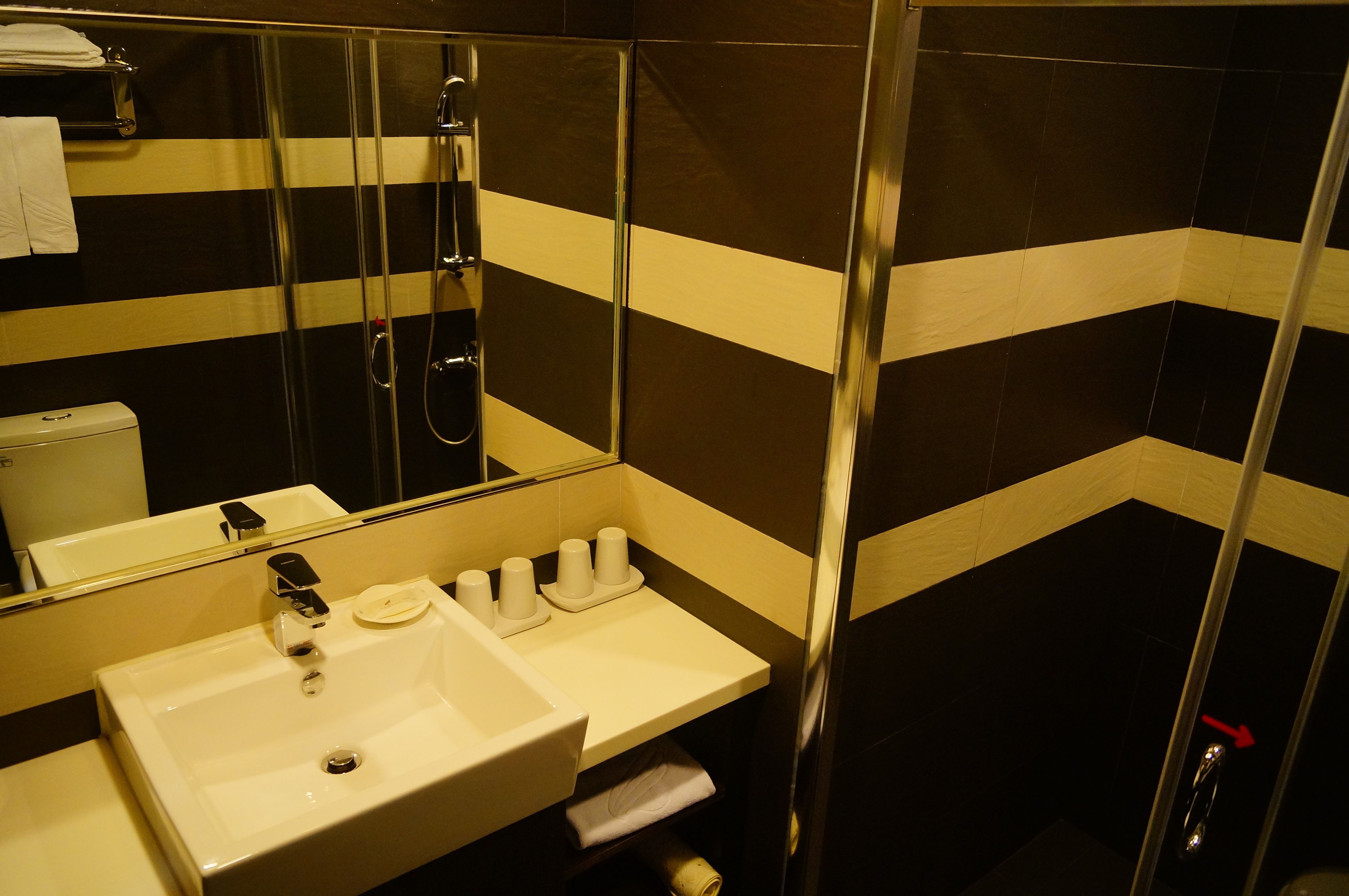 deluxe family view room | bathroom | hair dryer, towels