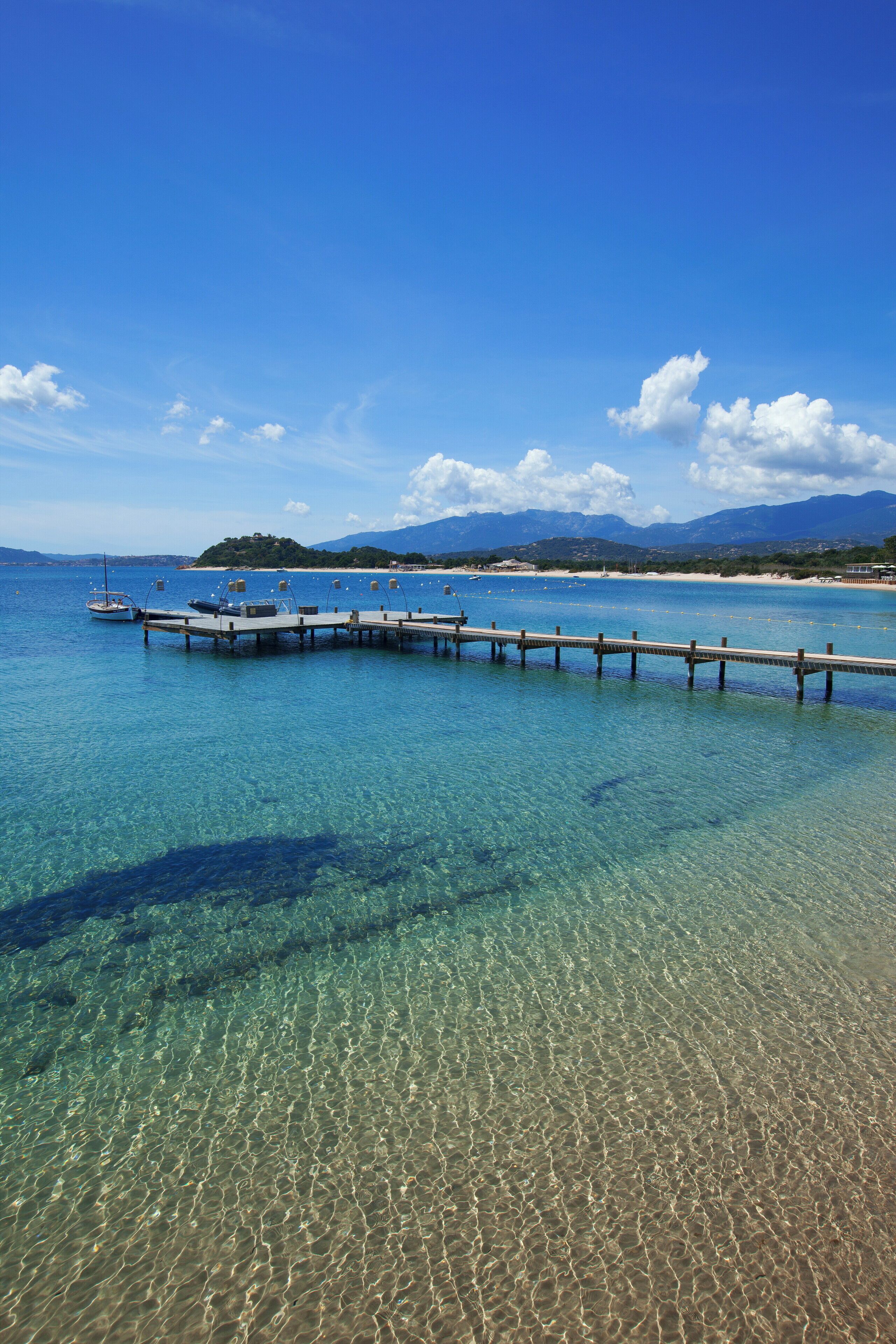 On the beach, sun-loungers, beach umbrellas, beach towels