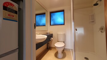 Family One Bedroom | Bathroom | Free toiletries, hair dryer, towels, soap
