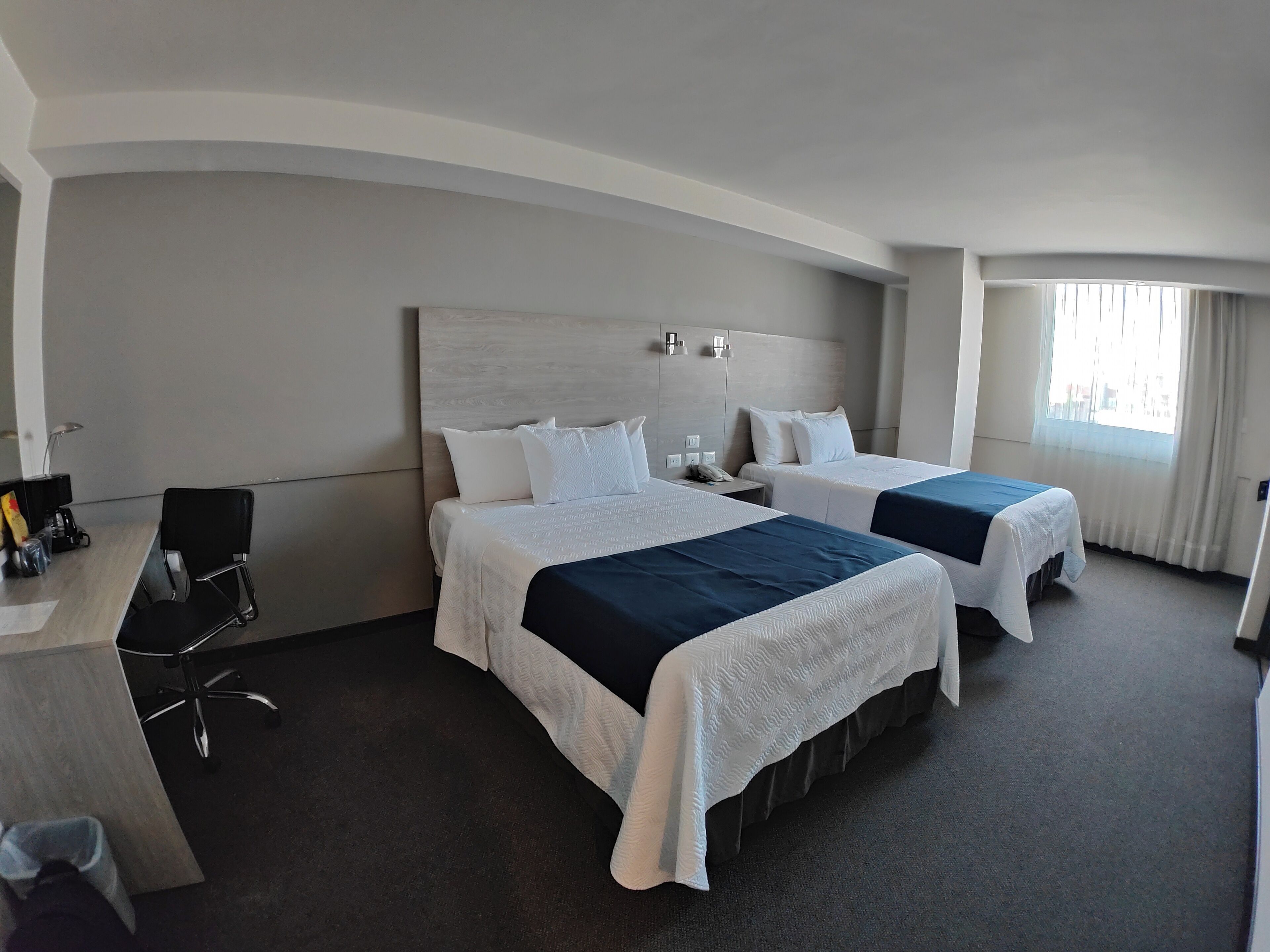 deluxe room, 1 bedroom | in-room safe, blackout curtains, soundproofing, iron/ironing board