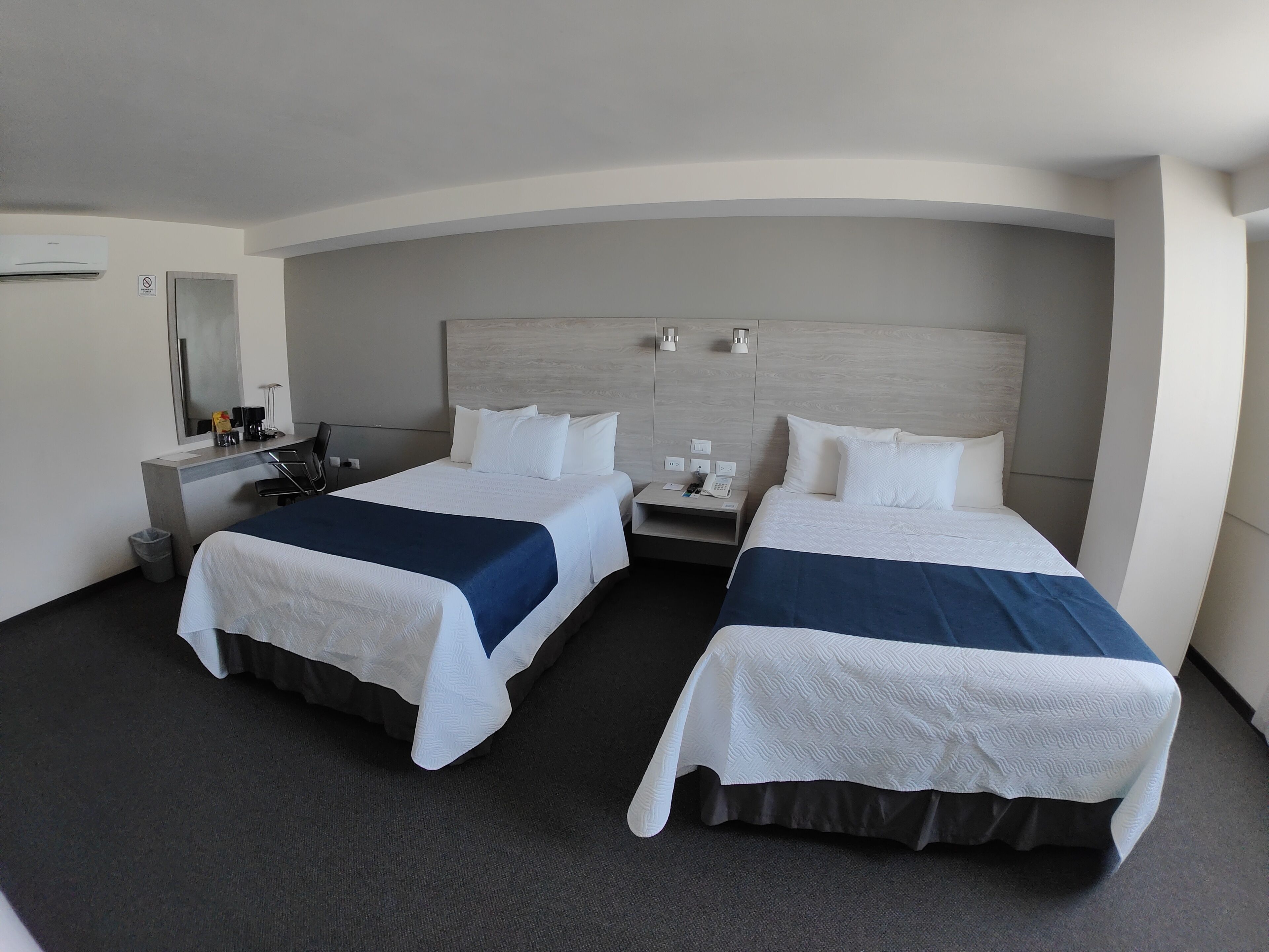 deluxe room, 1 bedroom | in-room safe, blackout curtains, soundproofing, iron/ironing board