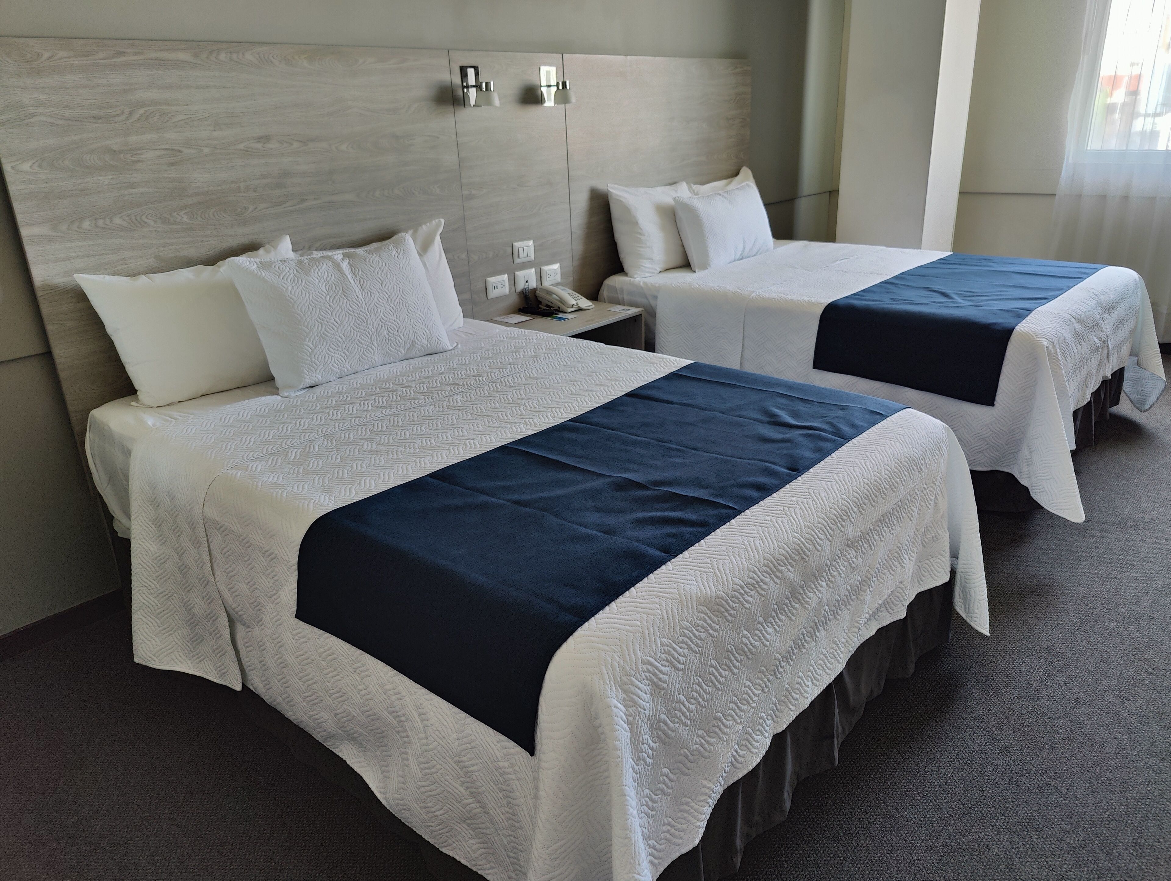 deluxe room, 1 bedroom | in-room safe, blackout curtains, soundproofing, iron/ironing board