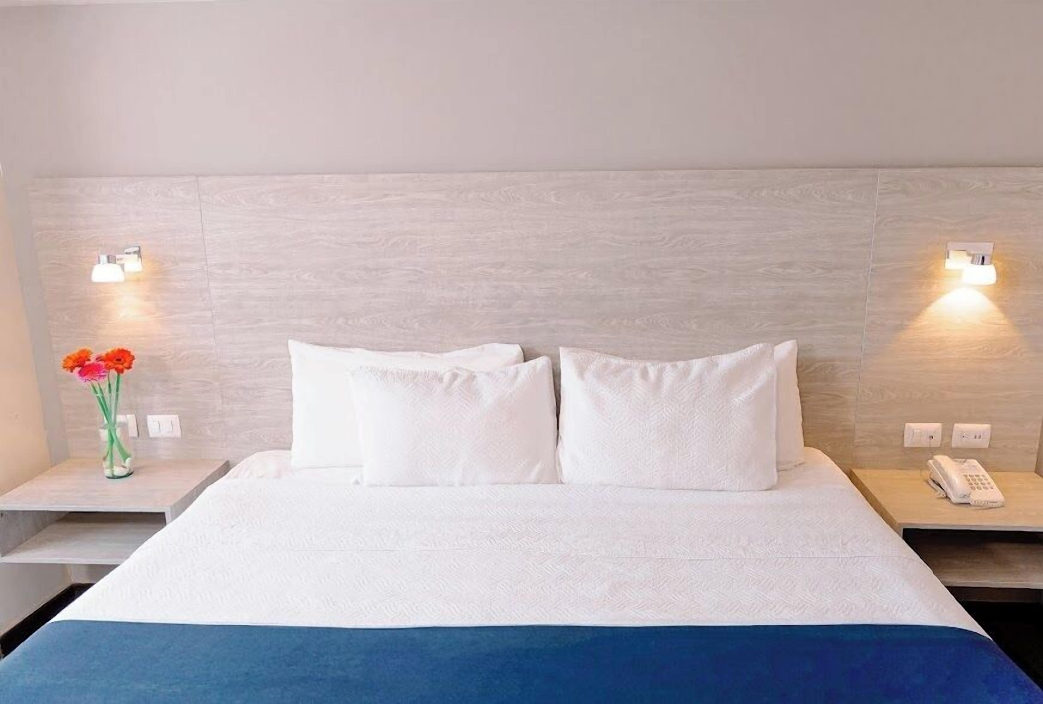 Premium bedding, in-room safe, blackout curtains, soundproofing