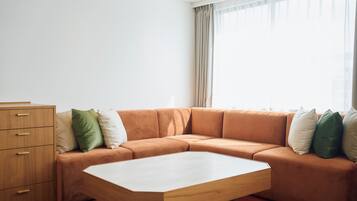 Premium bedding, down duvets, blackout curtains, soundproofing