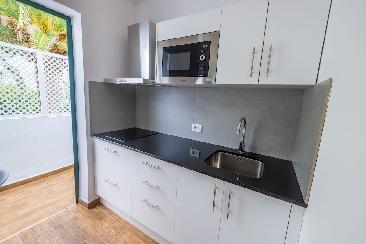 superior apartment, 2 bedrooms | private kitchen | full-sized fridge, microwave, stovetop, coffee/tea maker