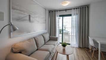 Superior Apartment, 2 bedrooms | Living area | Flat-screen TV