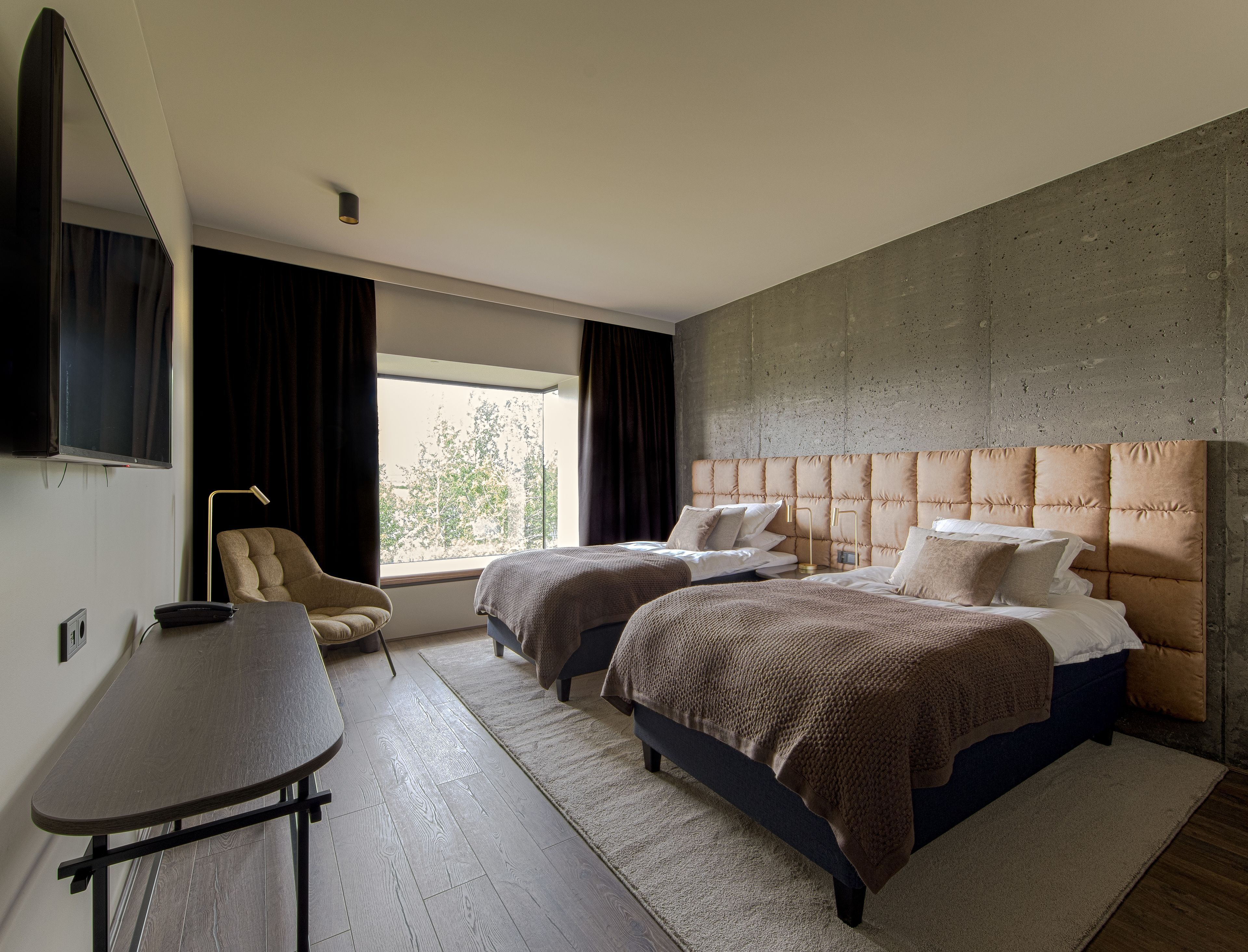 Hypo-allergenic bedding, desk, blackout curtains, rollaway beds