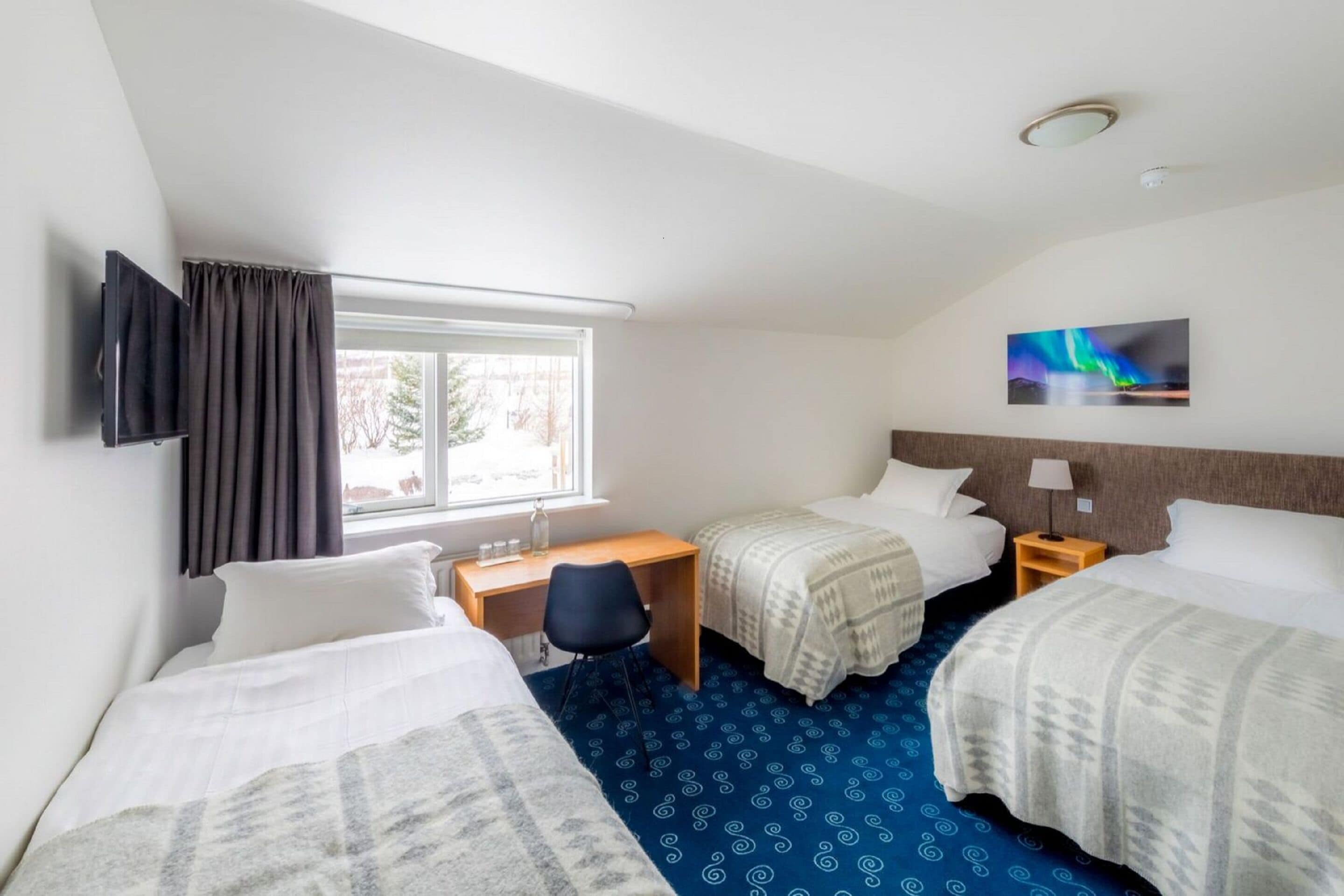 triple room | hypo-allergenic bedding, desk, blackout curtains, rollaway beds