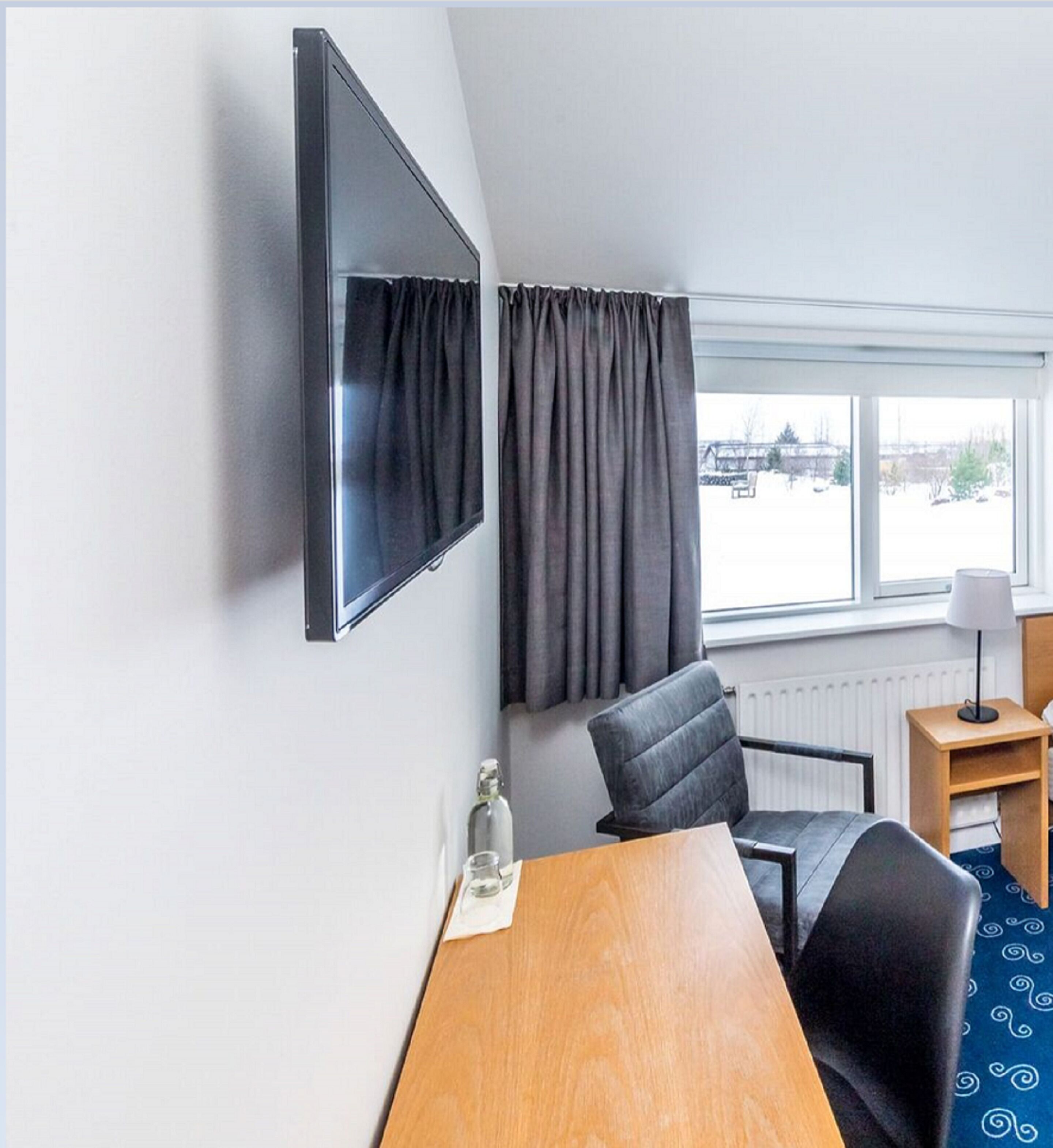 single room | hypo-allergenic bedding, desk, blackout curtains, rollaway beds