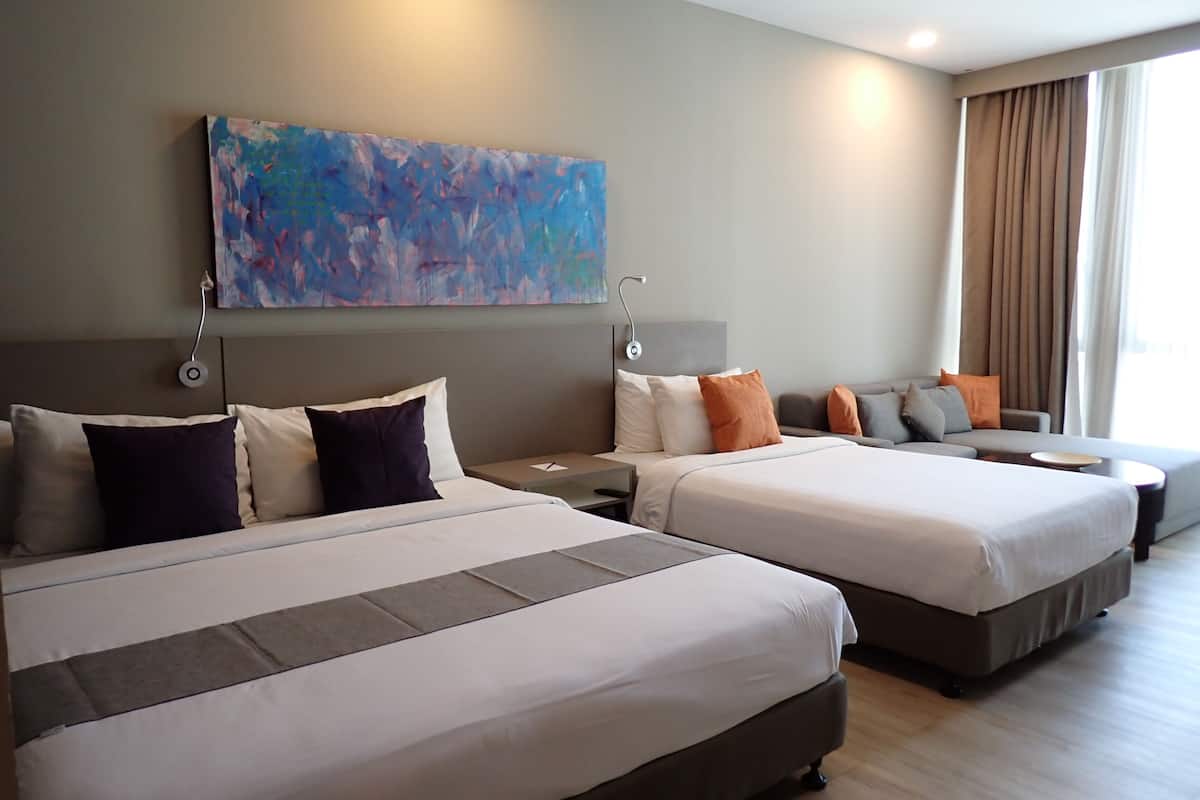 Deluxe Triple Room, Mountain View | Minibar (free items), in-room safe, desk