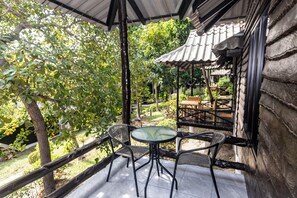 Habitación cuádruple de lujo | Terraza o patio