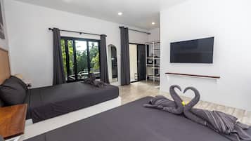 Habitación cuádruple de lujo | Caja de seguridad en la habitación, wifi gratis y ropa de cama