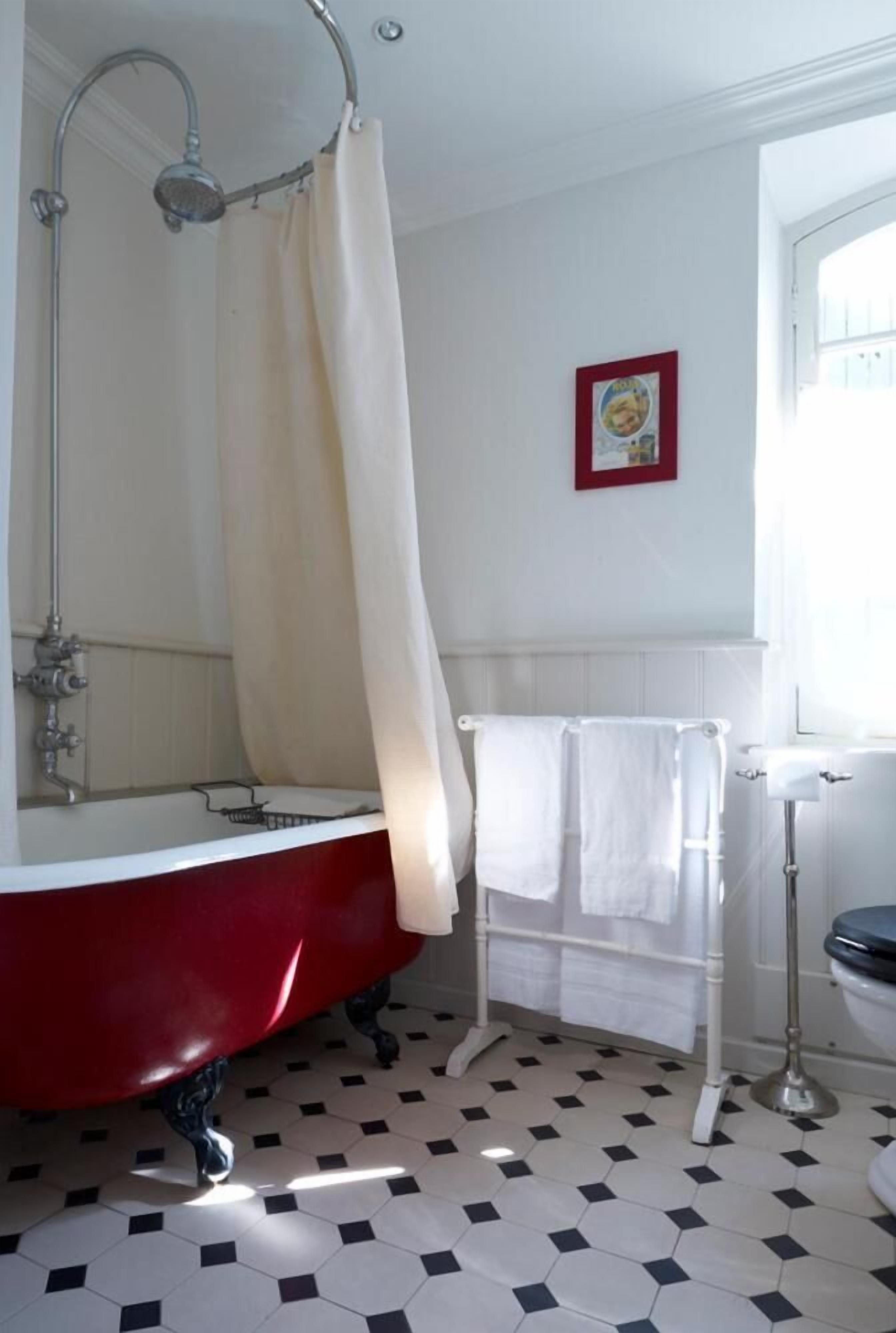 deep-soaking bathtub, rainfall showerhead, free toiletries, hair dryer