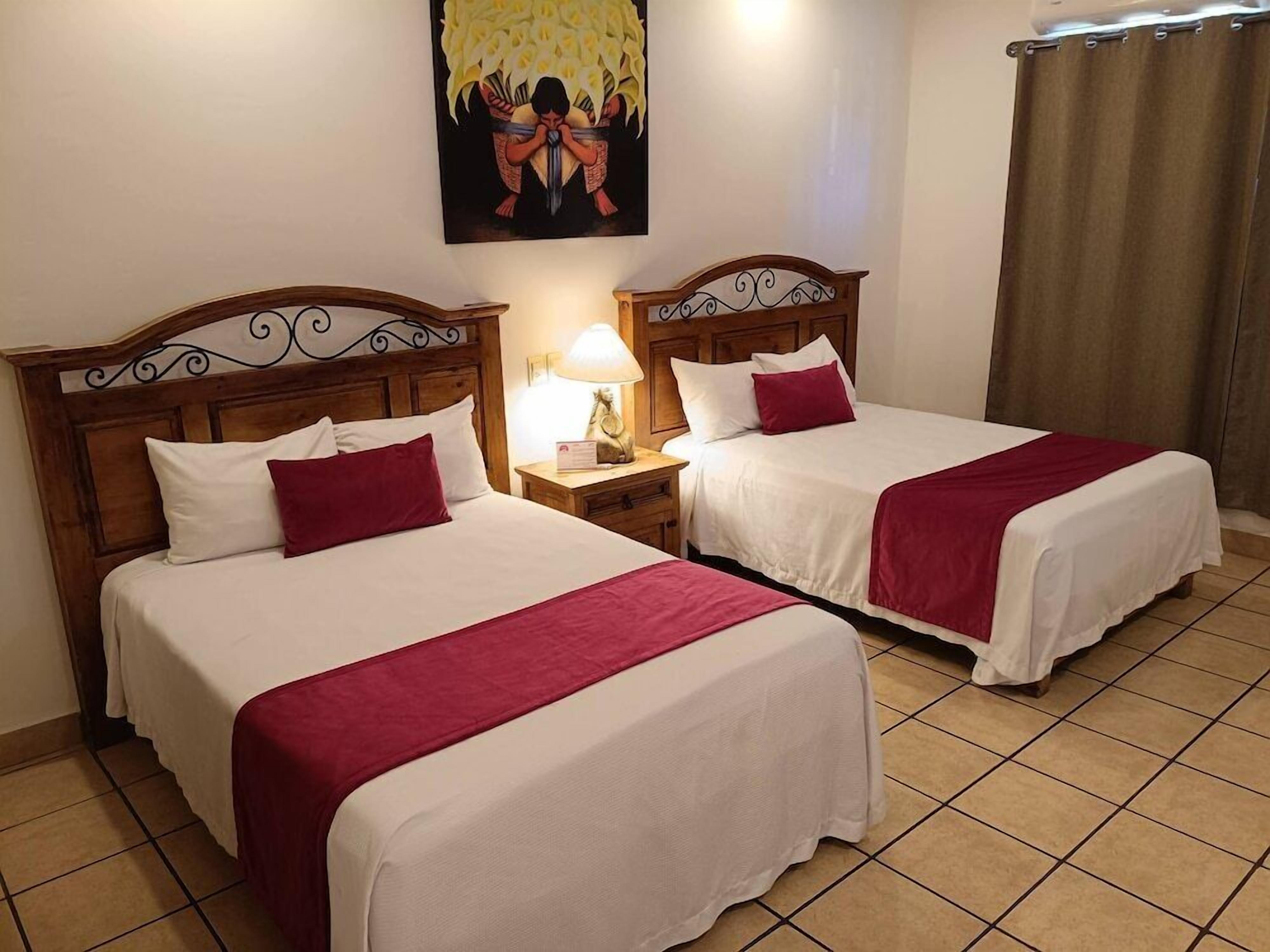 Muebles diferentes, cortinas blackout, wifi gratis y ropa de cama 