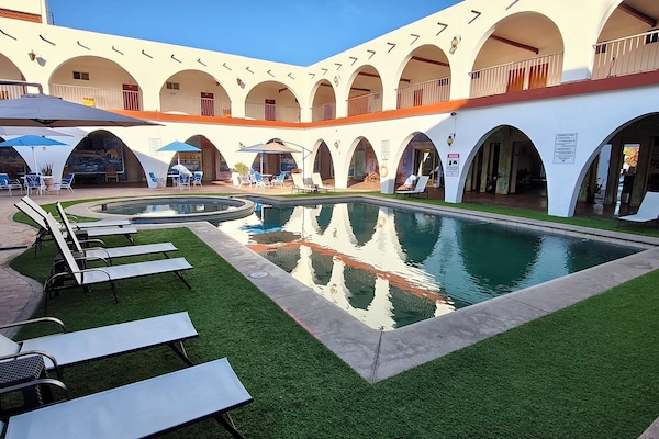 Outdoor pool, sun loungers