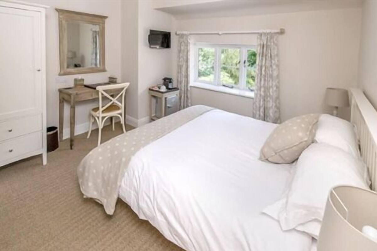 Habitación doble de lujo, baño en la habitación, vista al jardín