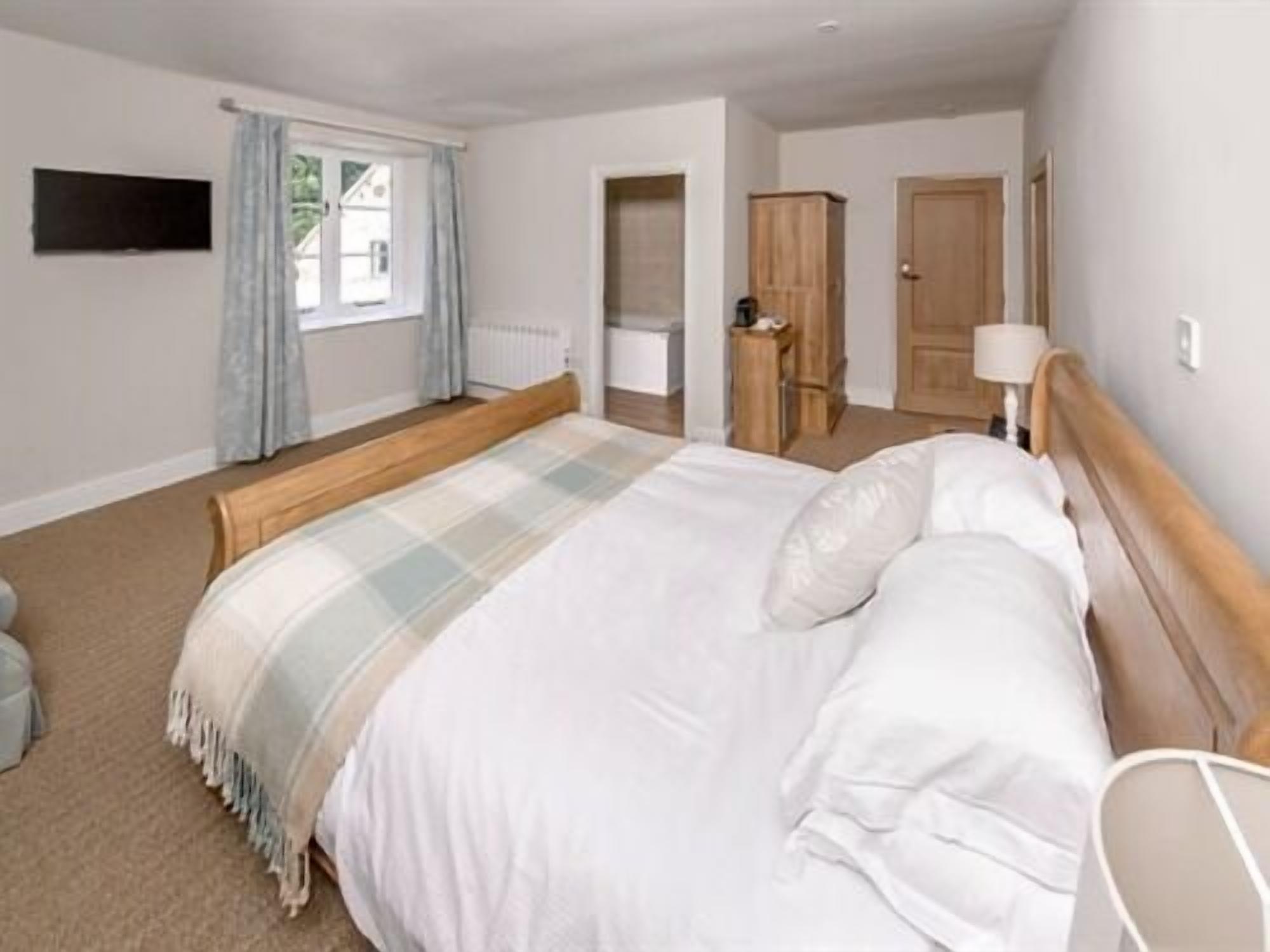 Habitación doble familiar, baño en la habitación, vista al jardín