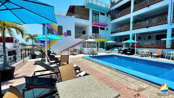 Outdoor pool, open 9 AM to 8:00 PM, sun loungers