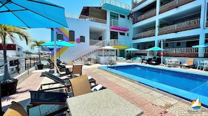 Outdoor pool, open 9 AM to 8:00 PM, sun loungers