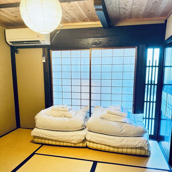 Chambre Économique avec lits jumeaux, non-fumeurs, salle de bains commune | Fer et planche à repasser, Wi-Fi gratuit