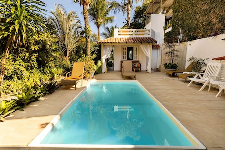 Outdoor pool, open 10:00 AM to 10:00 PM, sun loungers