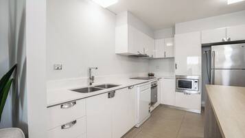 Deluxe One Bedroom Apartment | Private kitchen