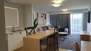 Deluxe One Bedroom Apartment | Living area