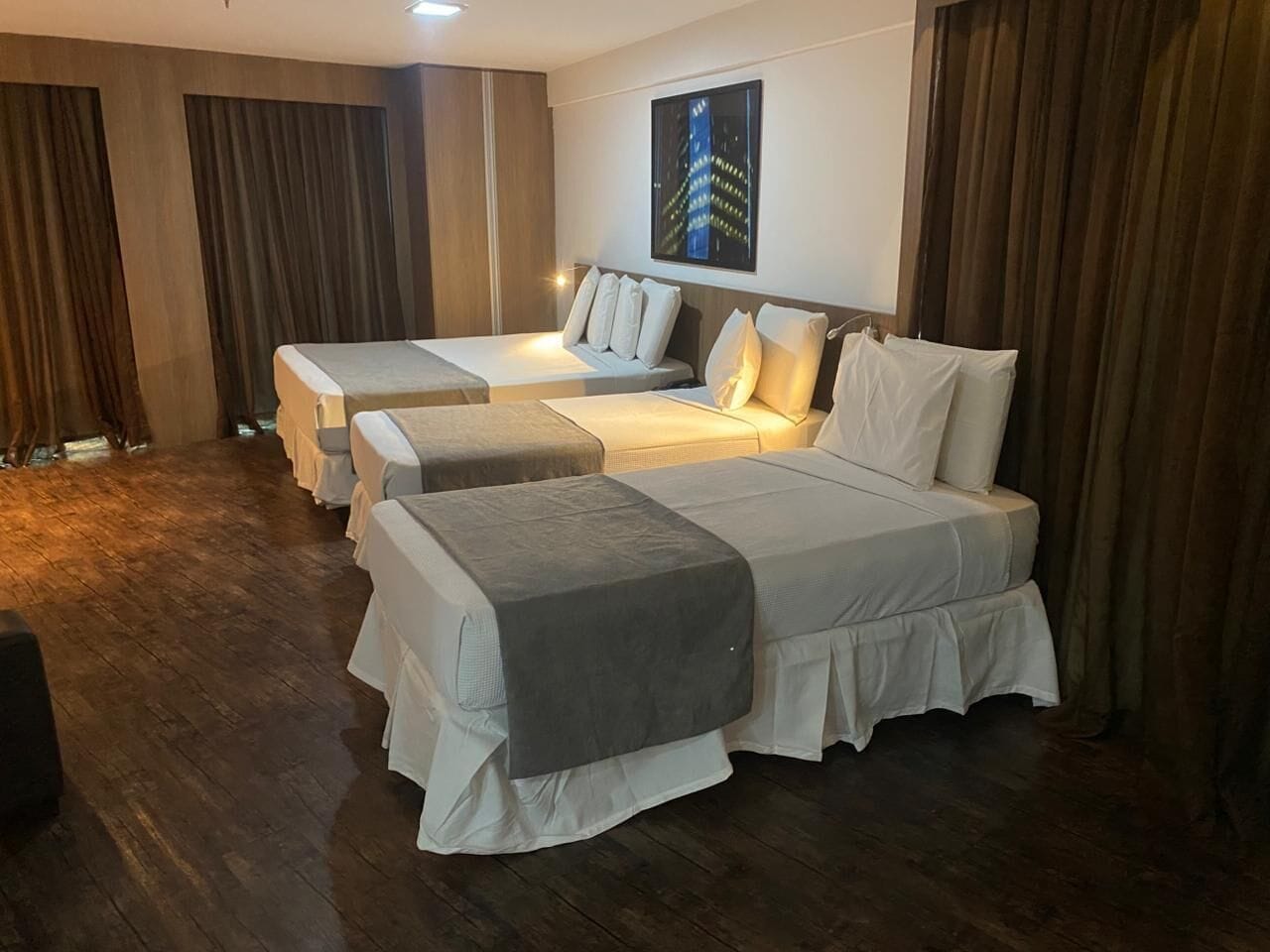 Deluxe Quadruple Room | Hypo-allergenic bedding, minibar, free WiFi, bed sheets