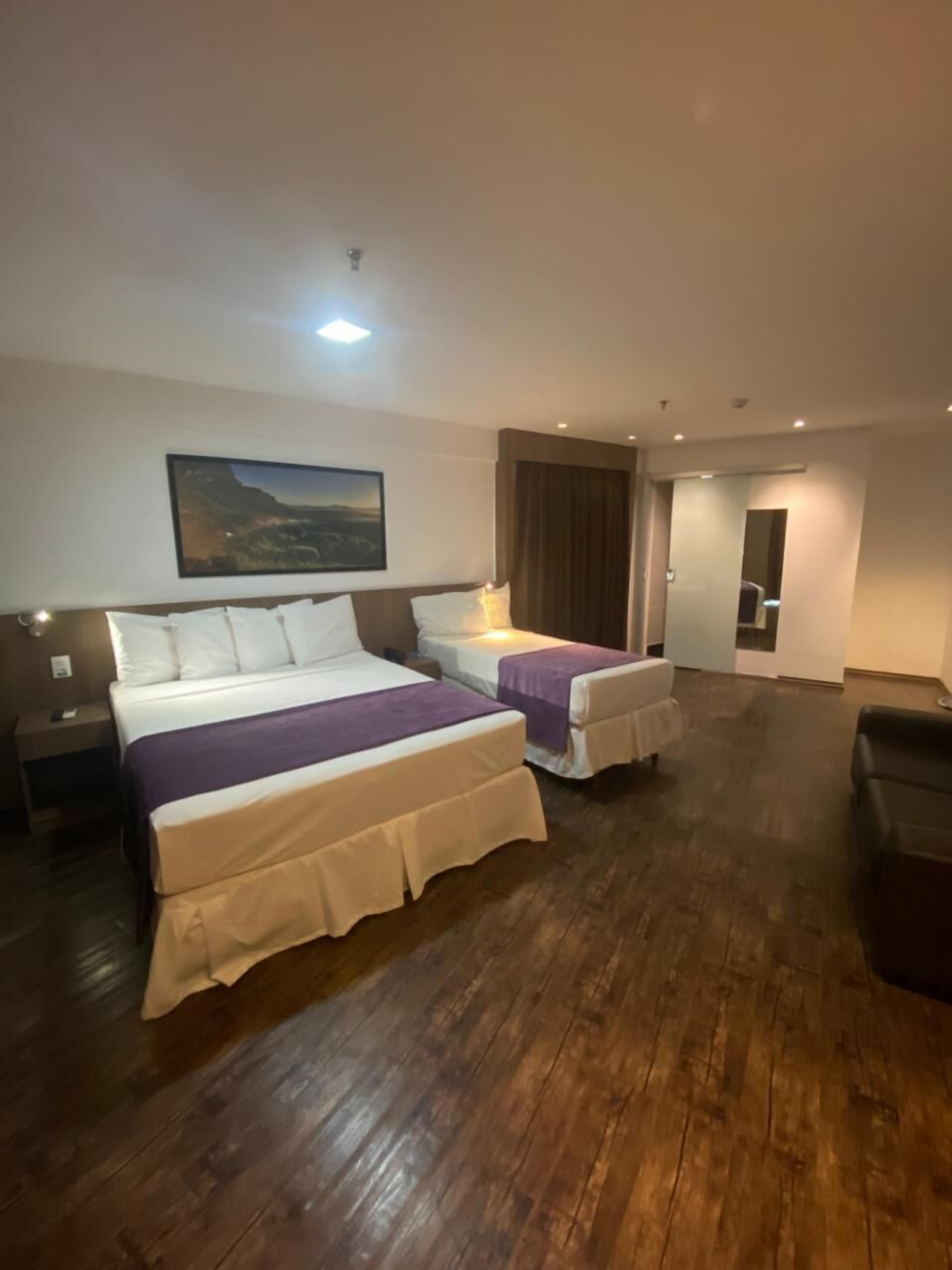 Standard Triple Room | Hypo-allergenic bedding, minibar, free WiFi, bed sheets