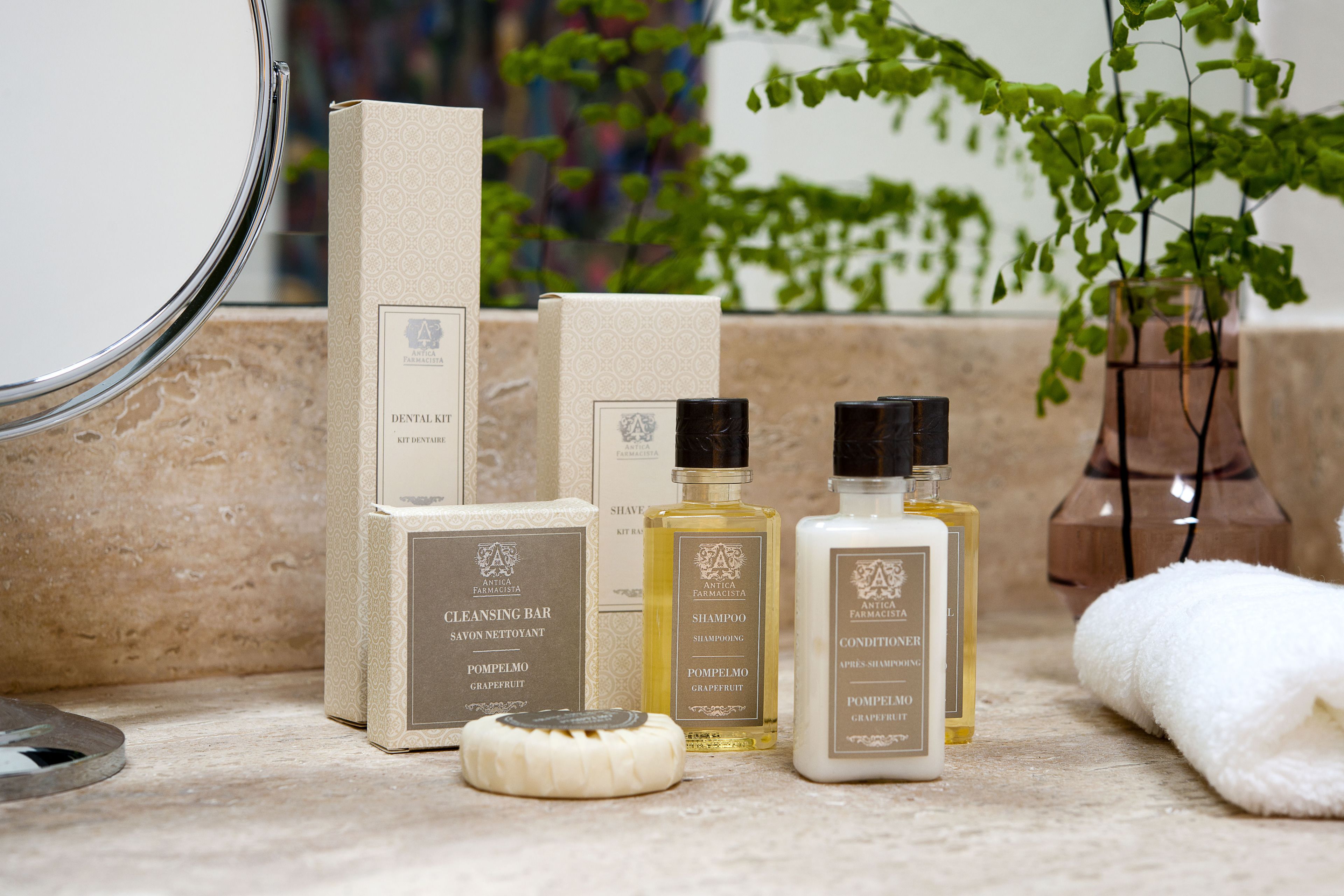 separate bathtub and shower, deep-soaking bathtub, designer toiletries