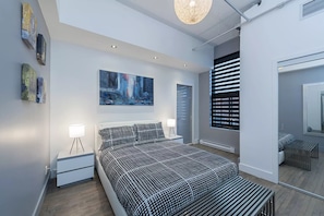 Executive Loft | 1 bedroom, premium bedding, memory foam beds, laptop workspace