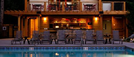 Outdoor pool, open 10 AM to 10 PM, pool umbrellas, pool loungers