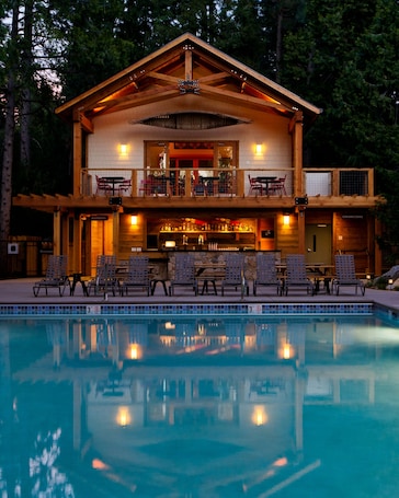 Outdoor pool, open 10 AM to 10 PM, pool umbrellas, sun loungers. Evergreen Lodge Yosemite