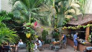 Outdoor dining - Hotel Mercurio - Caters to Gay Men (Puerto Vallarta)