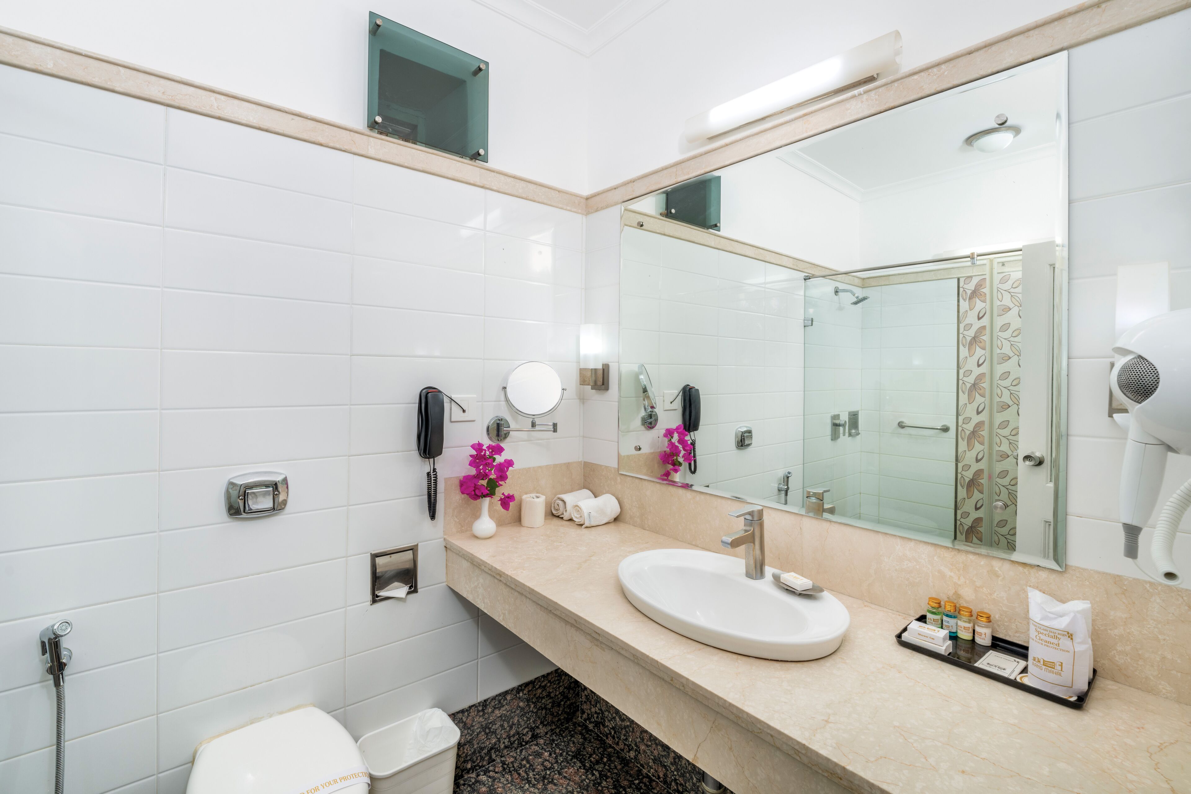 economy standard | bathroom | free toiletries, hair dryer, slippers, towels