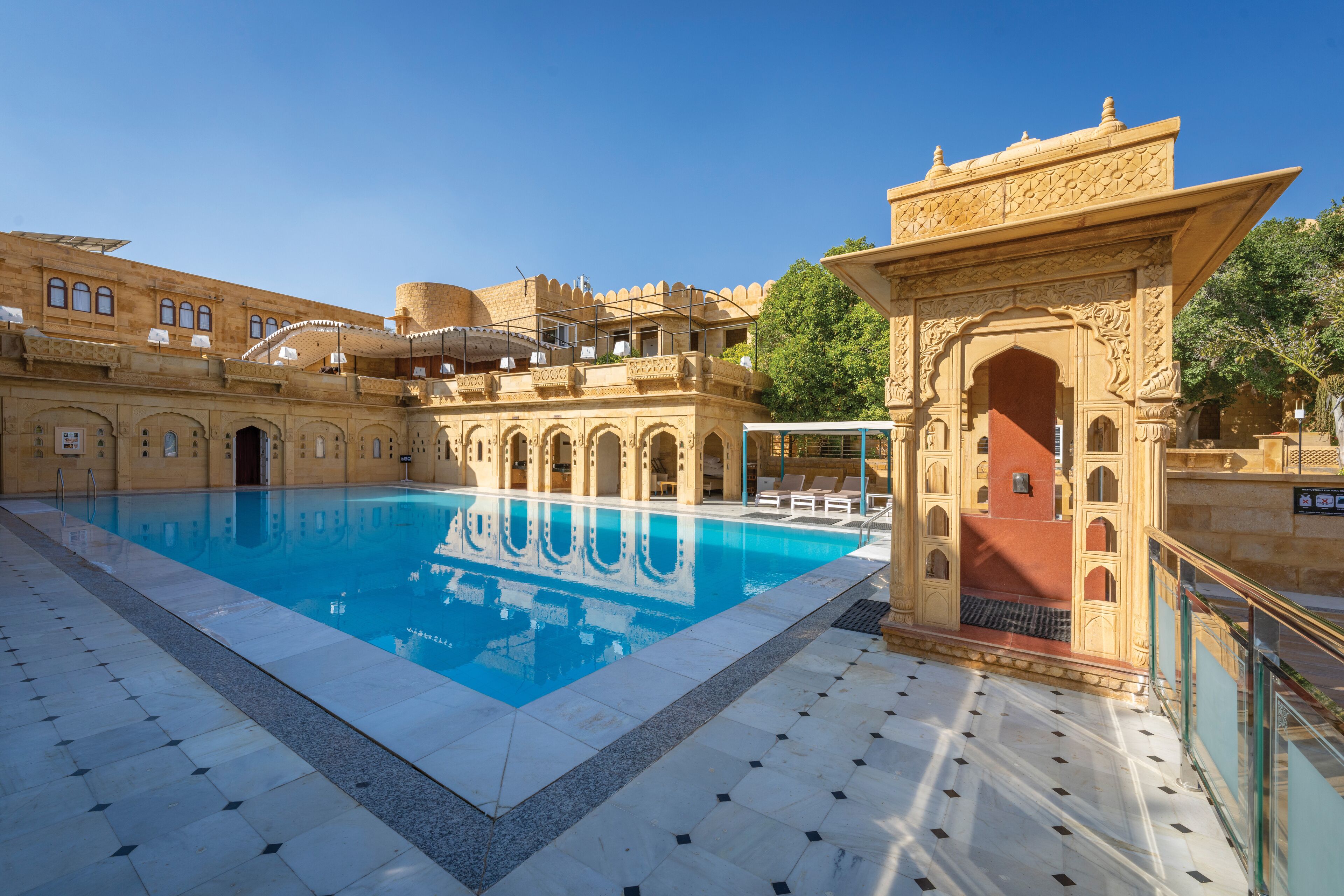 Outdoor pool, pool umbrellas, pool loungers