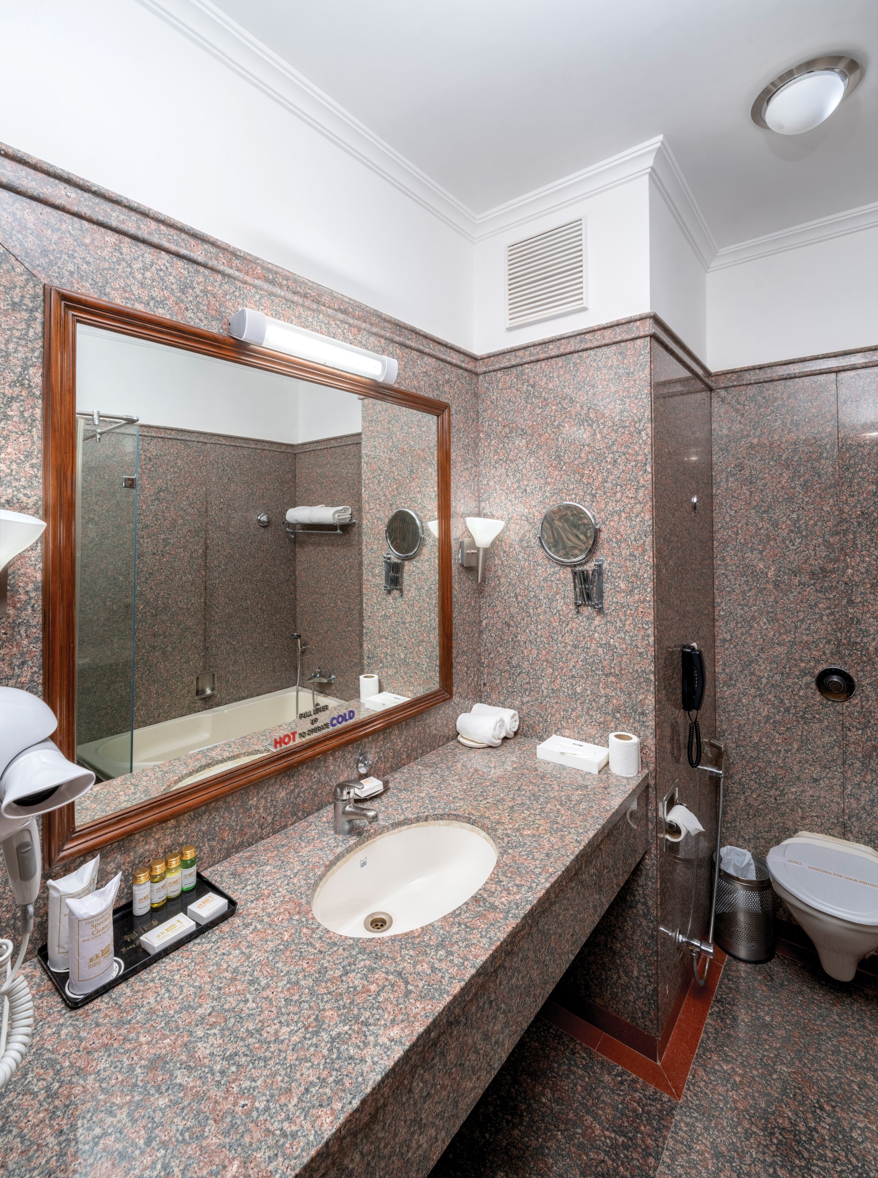 super deluxe | bathroom | free toiletries, hair dryer, slippers, towels