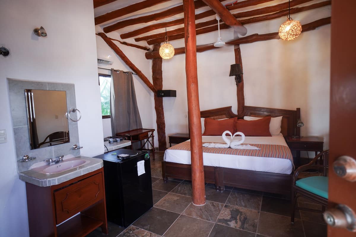 King Room, Partial Sea View | 1 bedroom, in-room safe