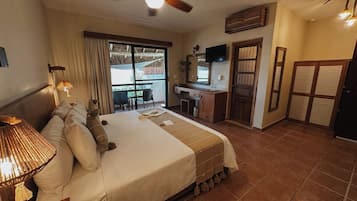 Superior Room, 1 King Bed, Partial Ocean View | Minibar, in-room safe, free WiFi, bed sheets
