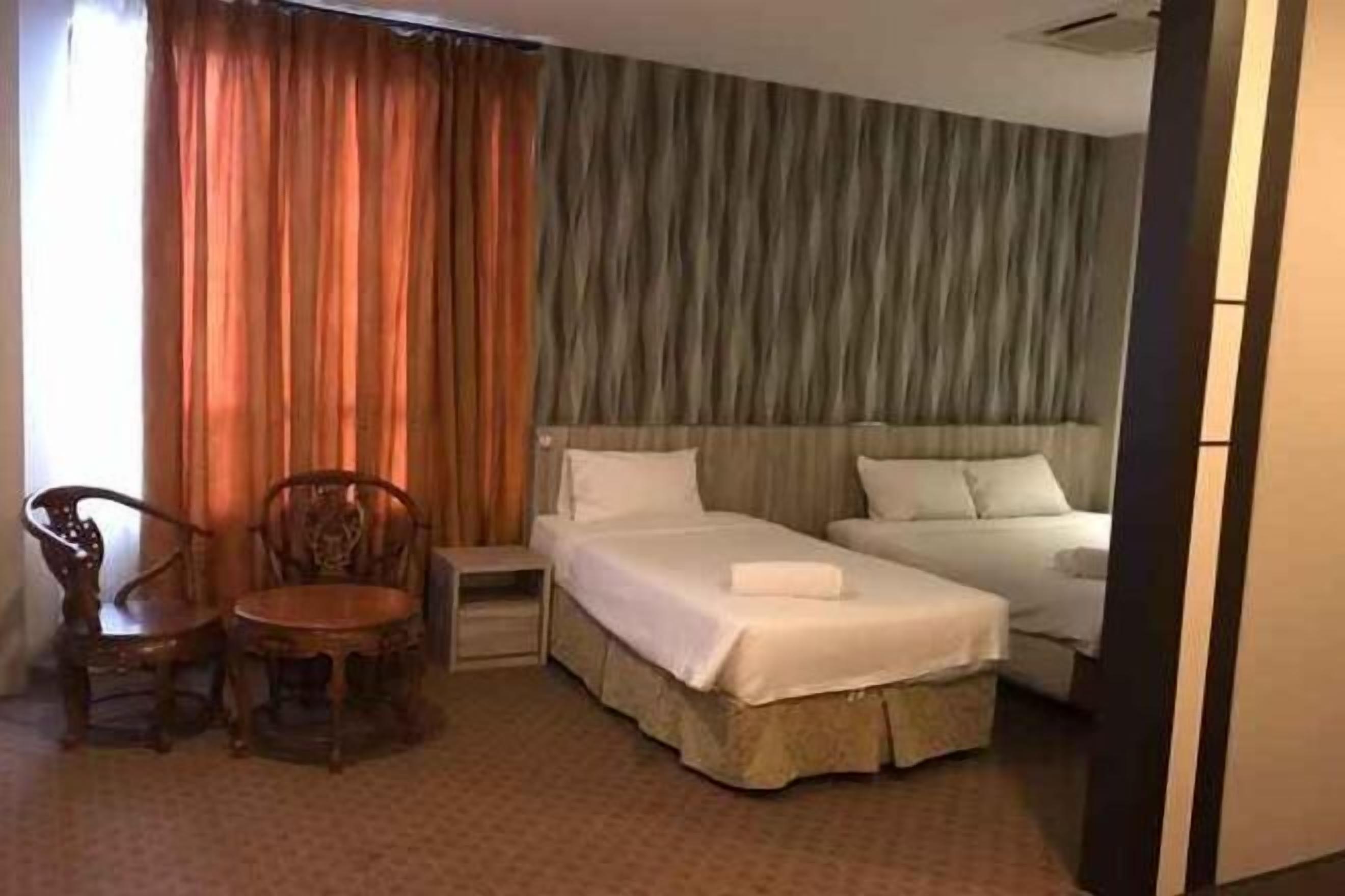 Desk, iron/ironing board, bed sheets