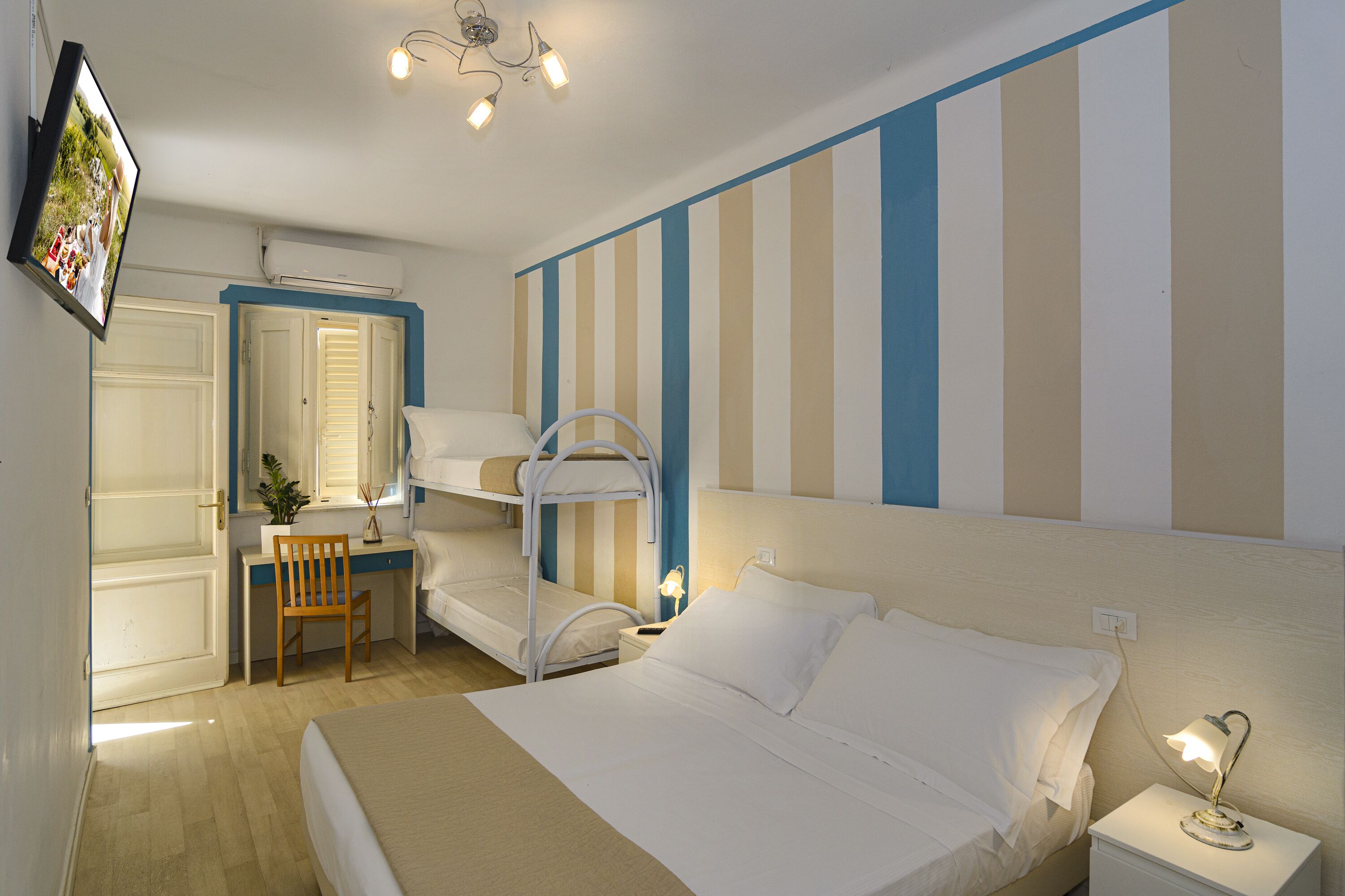 basic quadruple room, courtyard view, courtyard area | 2 bedrooms, down duvets, minibar, in-room safe